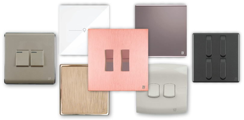 A selection of TJ wall switches in metallic, white and black finishes